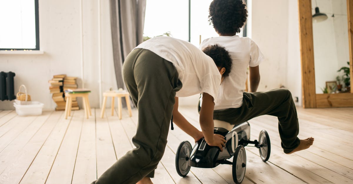 How do I get Next Car Game demo for Linux? - Unrecognizable black brothers riding toy car How do I get Next Car Game demo for Linux? - Unrecognizable black brothers riding toy car