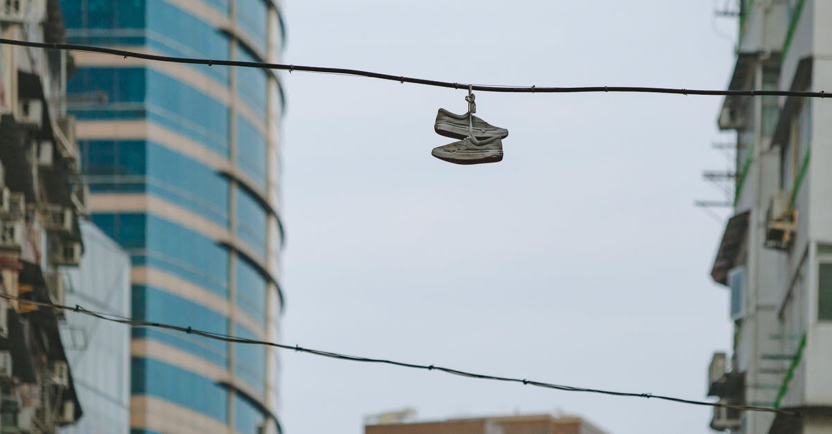 How do I get rid of hanging wires in fallout 4 - Pair of Shoe on Street Electric Cable