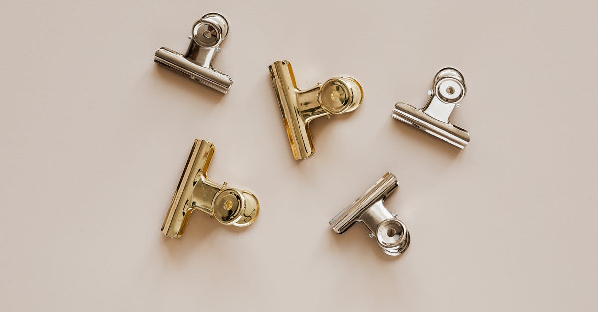 How do I get the Golden Kart pieces? - Set of metal clips on beige background How do I get the Golden Kart pieces? - Set of metal clips on beige background