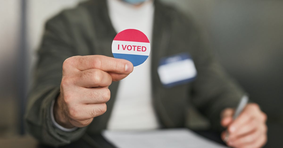 How do I get the hidden badge on Steam for the SteamSale ARG? - A Person Holding a Badge with I Voted