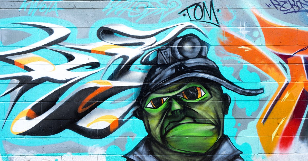How do I get the pixel sprays for each character? - Photography of Brick Wall With Graffiti
