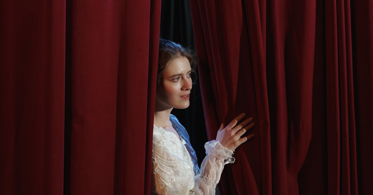How do I get the sticker behind the steel blocks in Gigabyte Grounds Stage 2? - Woman in White Floral Lace Dress Standing Behind a Curtain