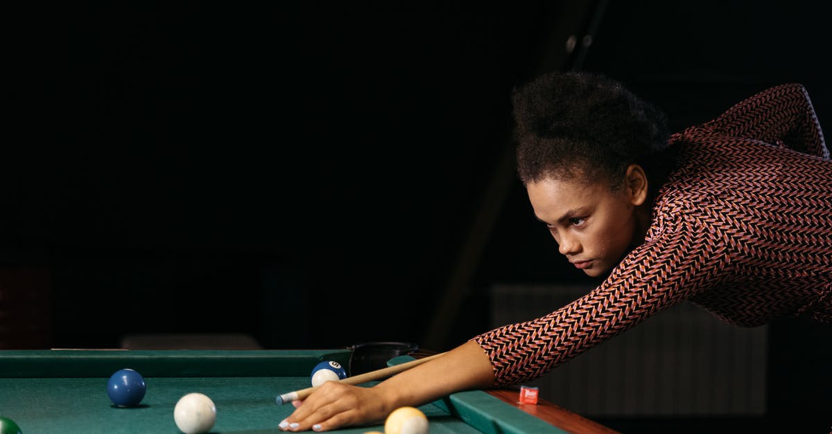 How do I get the vertical black bars while playing cs 1.6? - Man in Red and Black Checkered Dress Shirt Playing Billiard