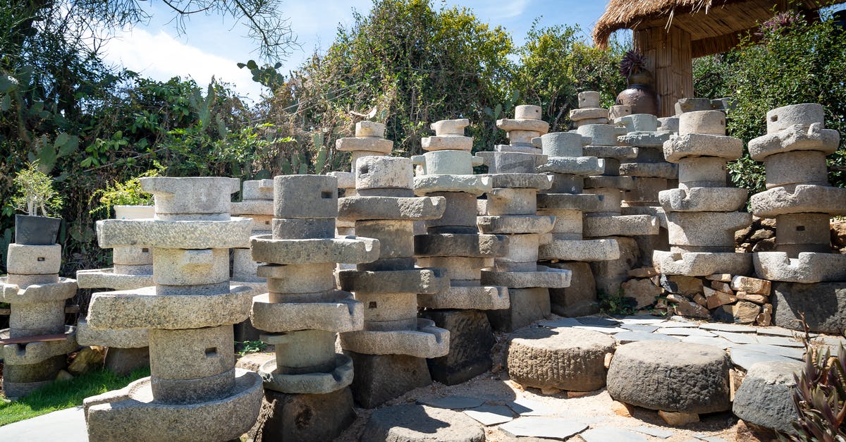 How do I get these weird Material Emancipation Grills? [closed] - Stacked stone pots in summer sunny garden