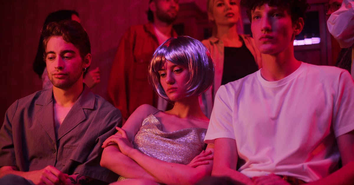 How do I have a threesome with Yen and Triss? - Woman in Pink Crew Neck T-shirt Sitting Beside Man in Gray Polo Shirt How do I have a threesome with Yen and Triss? - Woman in Pink Crew Neck T-shirt Sitting Beside Man in Gray Polo Shirt