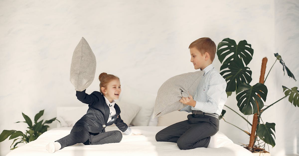 How do I have my king fight in battles? - Happy little kids having fun together during pillow fight game How do I have my king fight in battles? - Happy little kids having fun together during pillow fight game