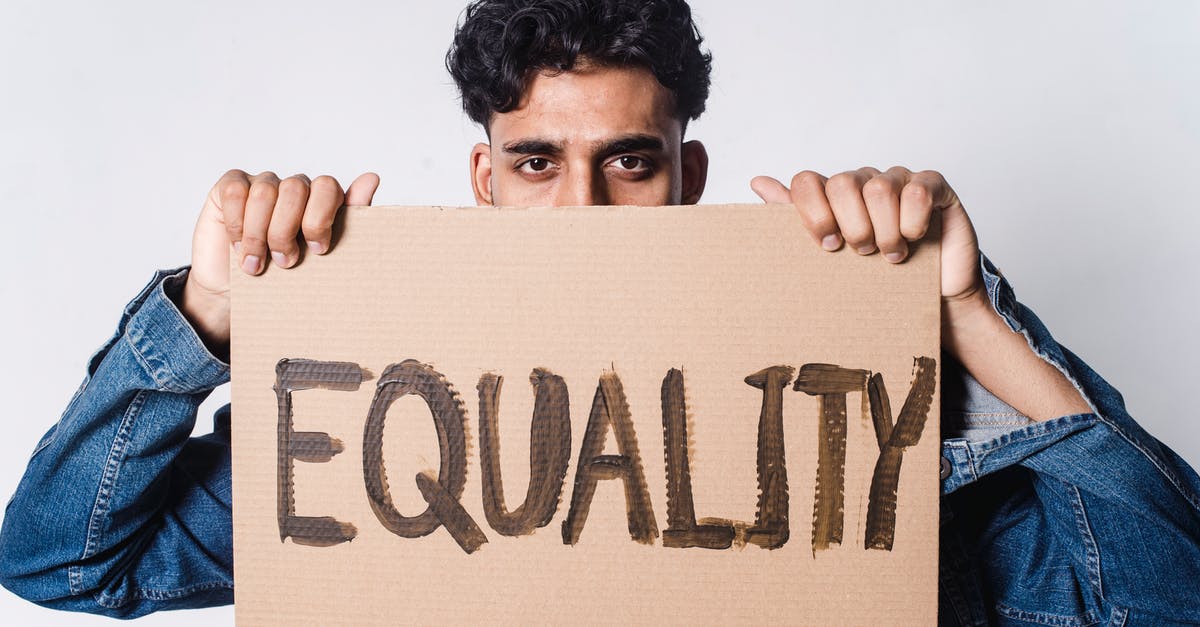 How do I hide the name text on a mob? - Man Holding Cardboard With Equality Text
