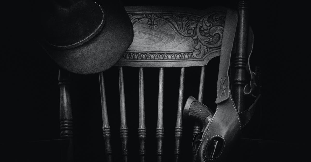 How do I holster weapons? [duplicate] - Brown Hat on Chair