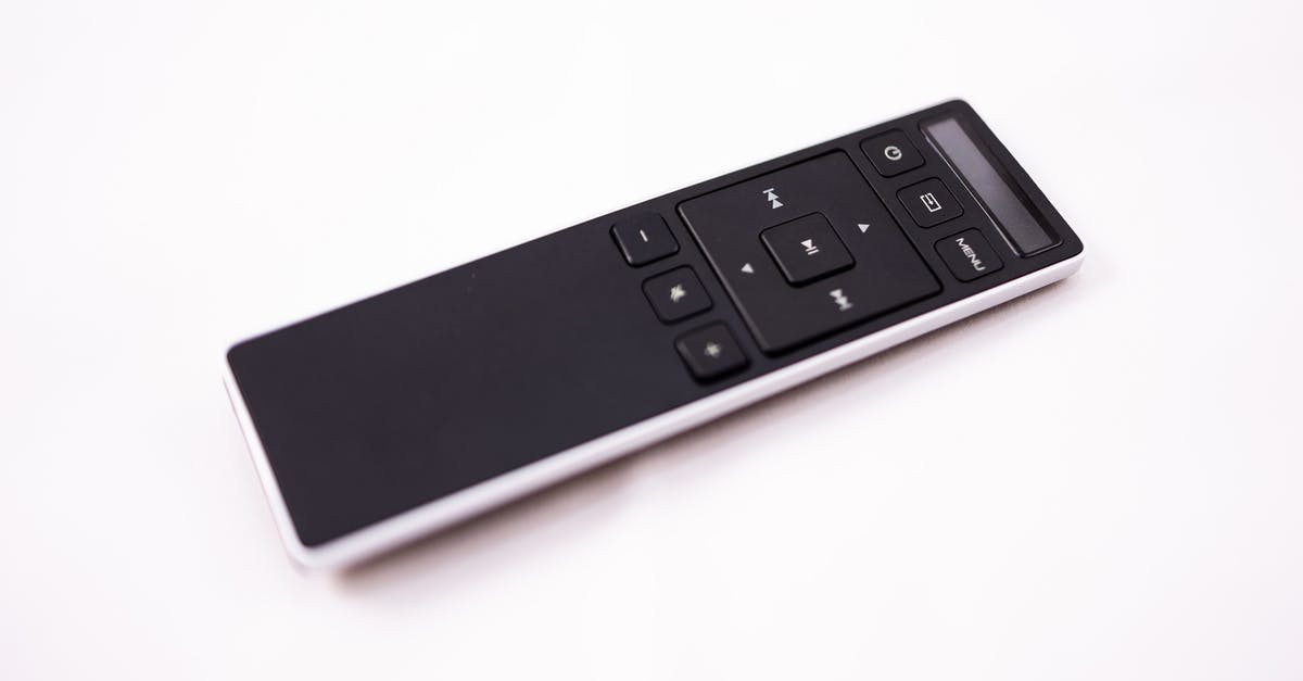 How do I identify a item in Diablo 3 on console? - Isolated dark contemporary remote control with buttons placed on white surface in studio How do I identify a item in Diablo 3 on console? - Isolated dark contemporary remote control with buttons placed on white surface in studio