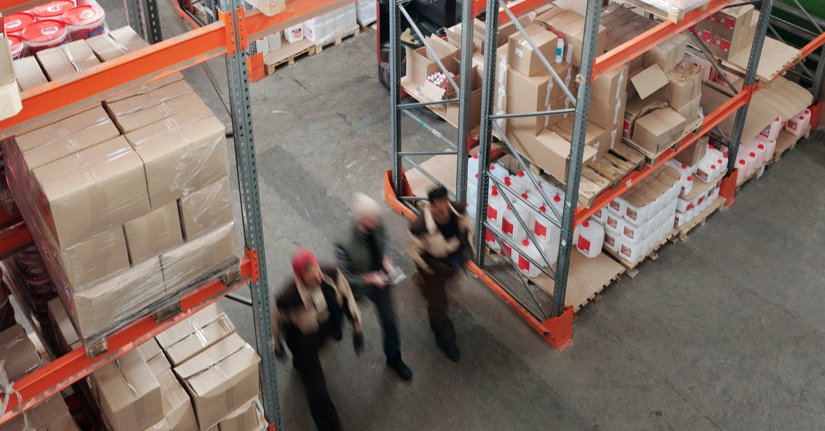How do I increase the number of workers in an industrial area? - Men Walking in a Warehouse How do I increase the number of workers in an industrial area? - Men Walking in a Warehouse