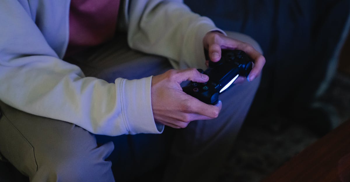 How do I input custom names into my game? - Faceless gamer with joystick playing video game
