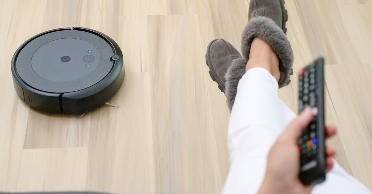 How do I keep Endermen out of my house? - Black Vacuum Cleaner on Wooden Flooring