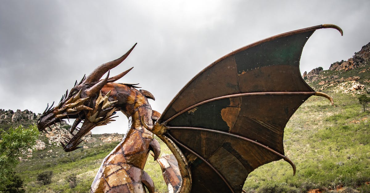 How do I kill the Adra Dragon - Brown Dragon Statue on Green Grass Field