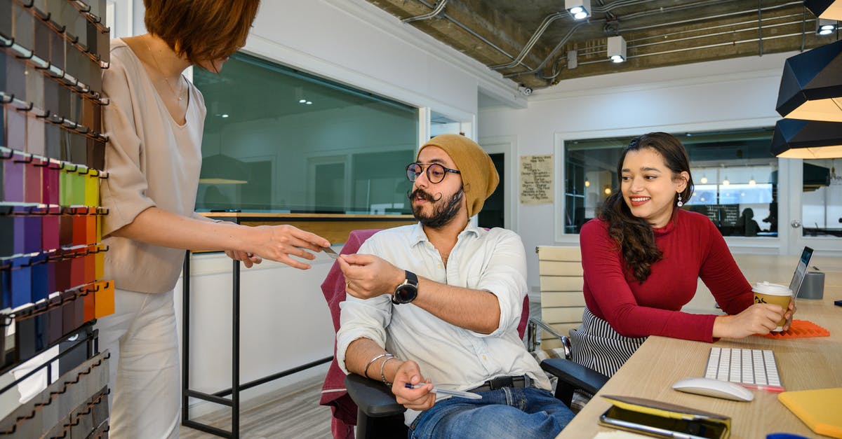 How do I know I'm choosing the best card in the keg? - Woman Handing Card to a Man Bearded Sitting 