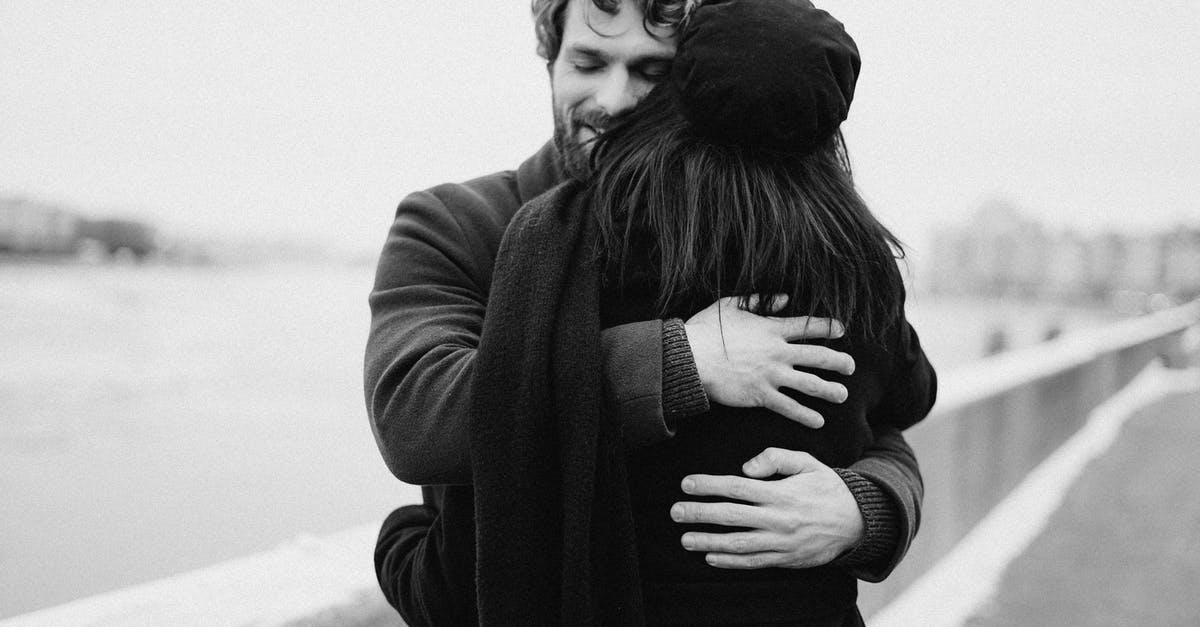 How do I know what a faction's relationship with me is? - Man and Woman Hugging on Bay View