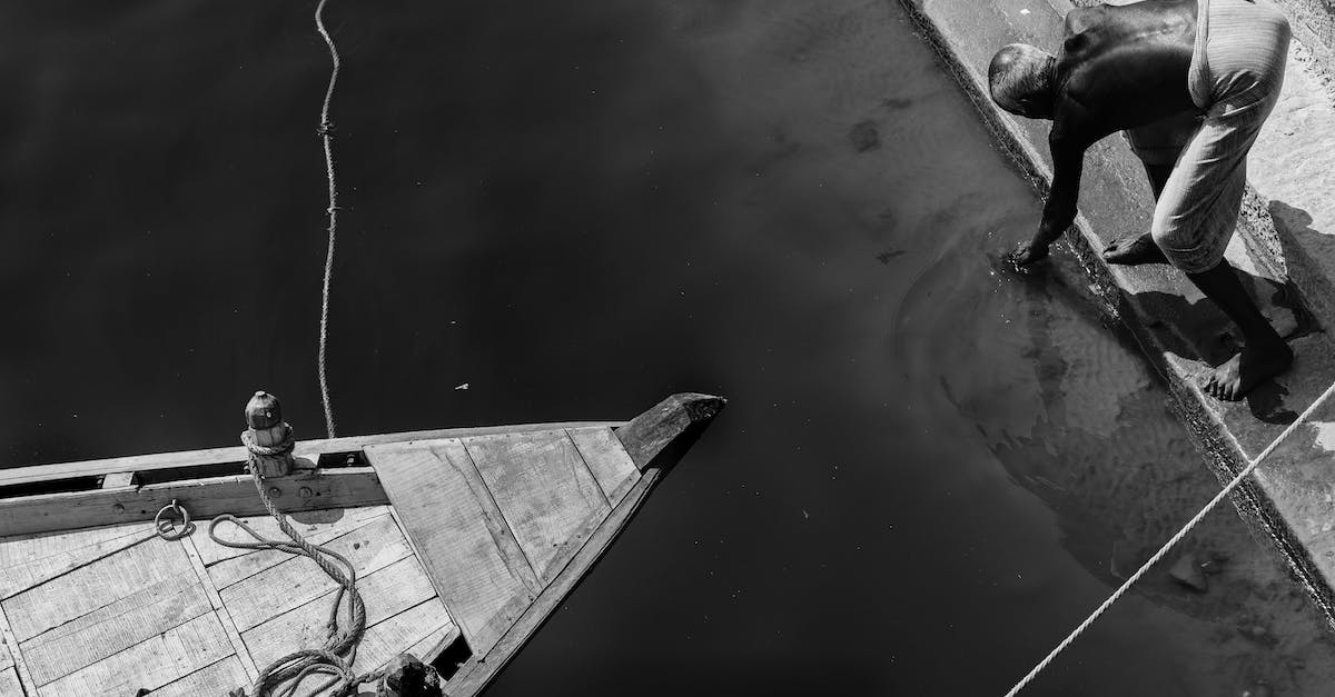 How do I make a rain detector on Minecraft? - Grayscale Photo of Man in Boat on Water How do I make a rain detector on Minecraft? - Grayscale Photo of Man in Boat on Water