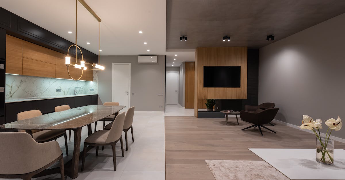 How do I make a simple Redstone Door with a lever that villagers can't go through? - Dining room with table and near open plan kitchen