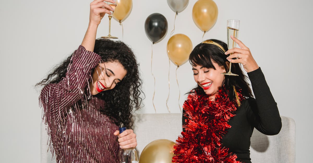 How do I make my friend Notable? - Cheerful friends with glasses of tasty champagne smiling and congratulating each other among balloons How do I make my friend Notable? - Cheerful friends with glasses of tasty champagne smiling and congratulating each other among balloons