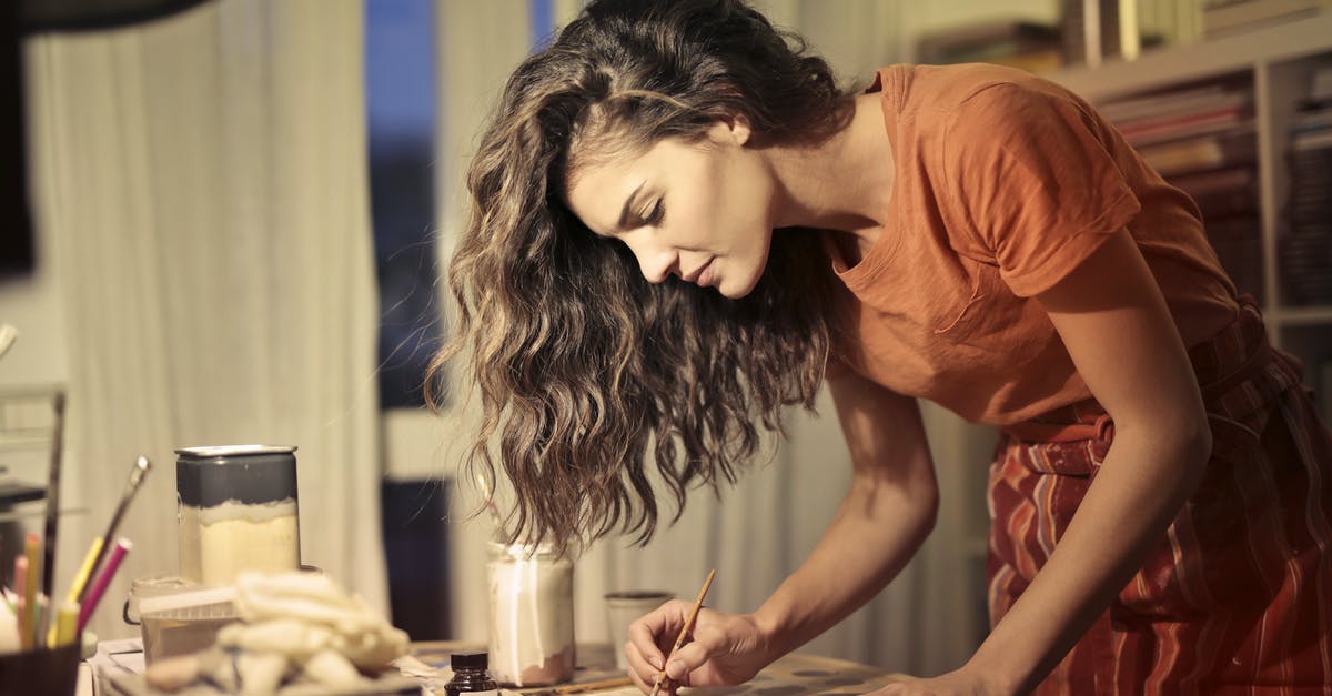 How do I make myself less fascinating? - Creative female artisan drawing in workshop