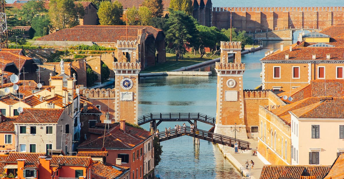 How do I make the buildings not have a medieval look? - Brown Concrete Buildings and Bridge How do I make the buildings not have a medieval look? - Brown Concrete Buildings and Bridge
