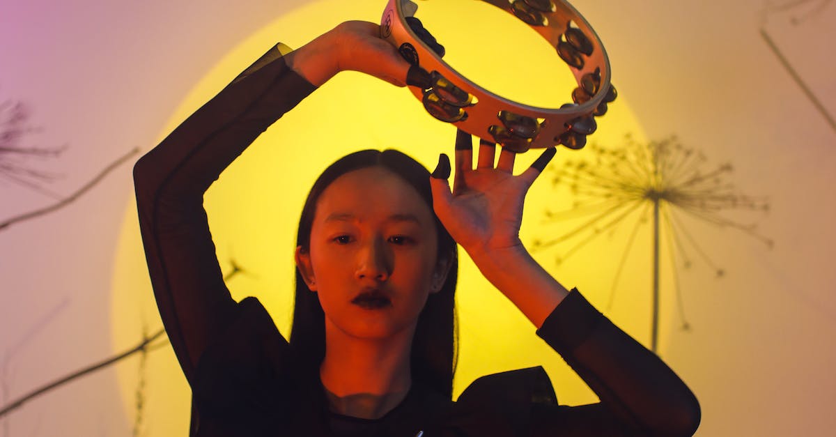 How do I make the Witch Doctor respawn? [duplicate] - A Woman in Black Long Sleeve Dress Holding a Tambourine
