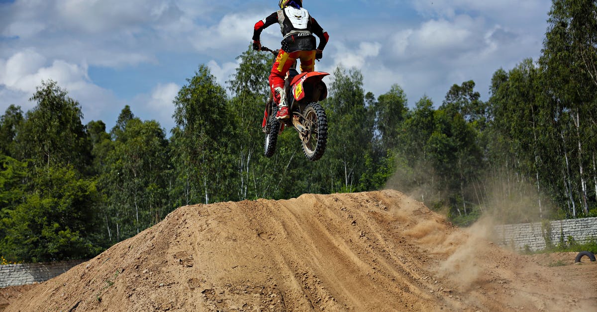 How do I maximize my speed at the beginning of a round? - Person Riding Red Dirk Bike Mid Air Ramping How do I maximize my speed at the beginning of a round? - Person Riding Red Dirk Bike Mid Air Ramping