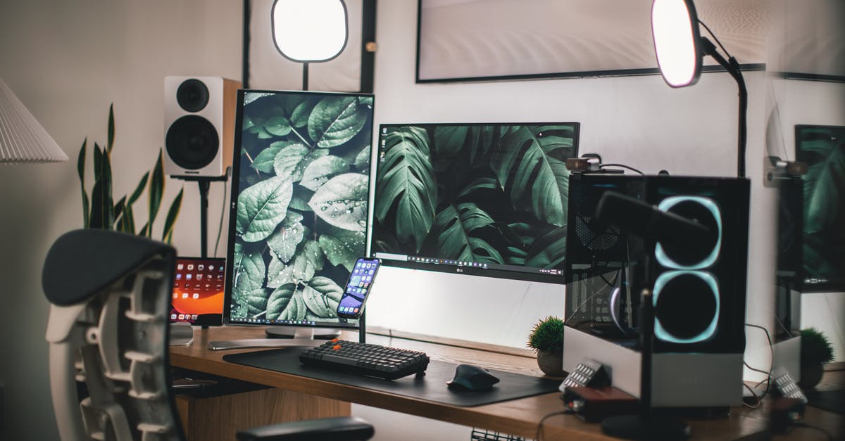 How do I move Steam games from one computer to another without downloading them again? [duplicate] - Black Flat Screen Computer Monitor on White Wooden Desk