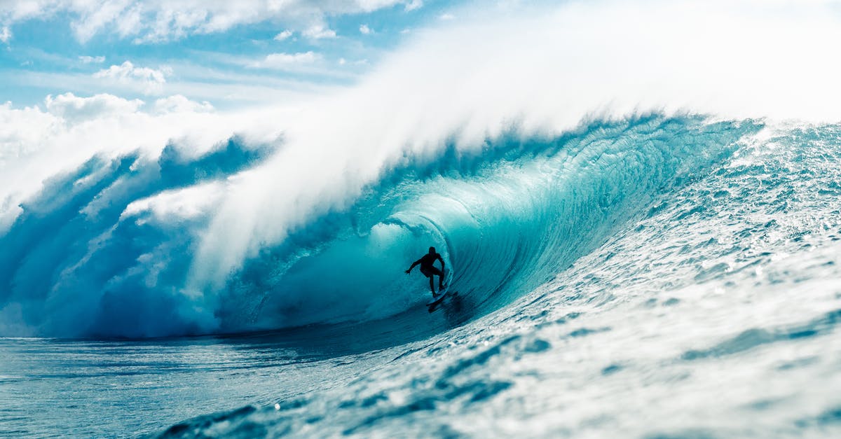 How do I move this account-bound booster to an alt? - Man riding surfboard in wavy ocean