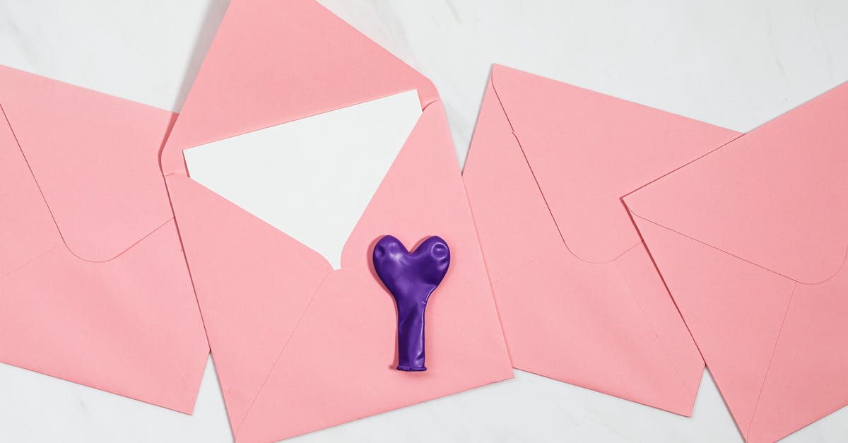 How do I open the keyholes? - Orange Paper on White Surface How do I open the keyholes? - Orange Paper on White Surface