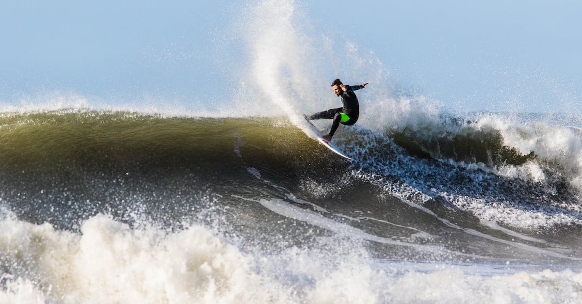 How do I pass the first wave on hard? - Man Surfing on Sea Waves