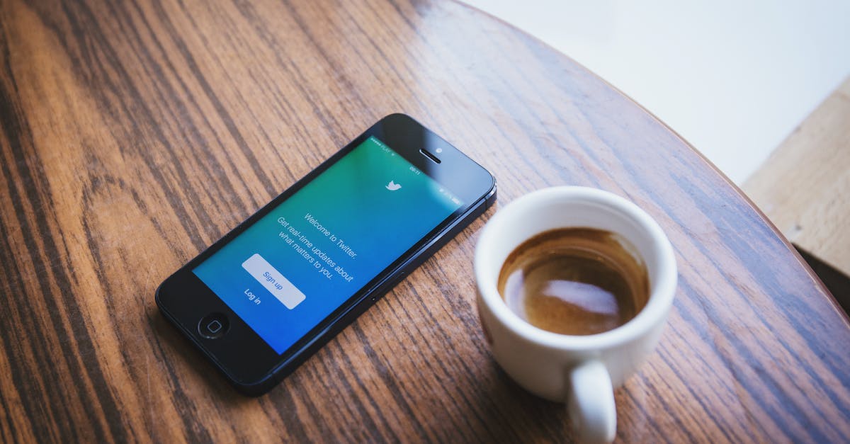 How do I pick up logs I have knocked over? - White Ceramic Teacup Beside Black Iphone 5 on Brown Wooden Table