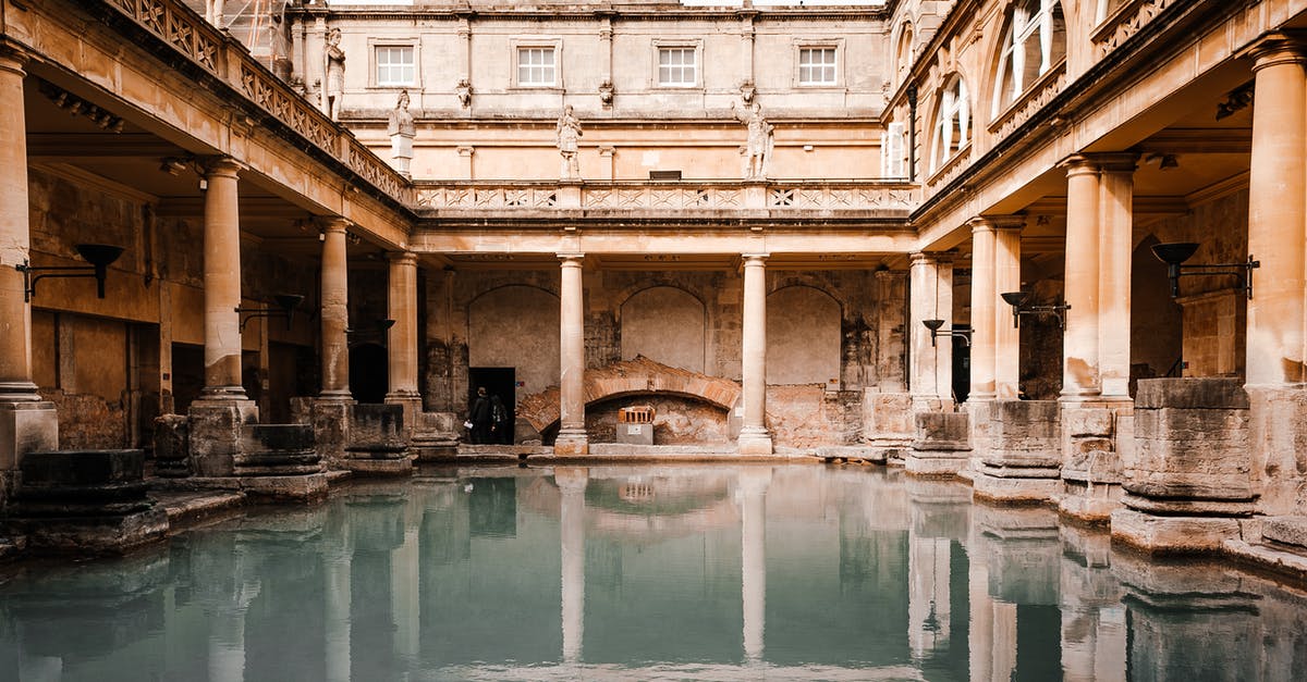 How do I place blocks out of blockspaces? - Exterior of worn out medieval stone building with columns located near canal with reflection on water surface in old city How do I place blocks out of blockspaces? - Exterior of worn out medieval stone building with columns located near canal with reflection on water surface in old city