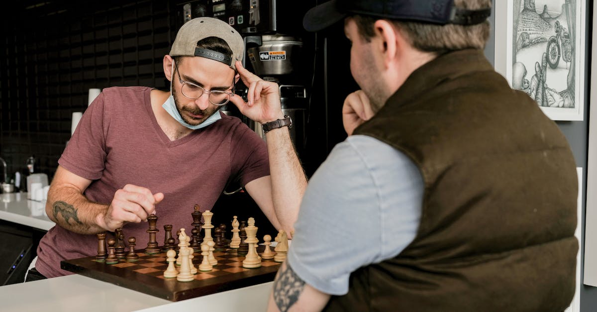 How do I play Chess in Watch Dogs? - Two men playing chess