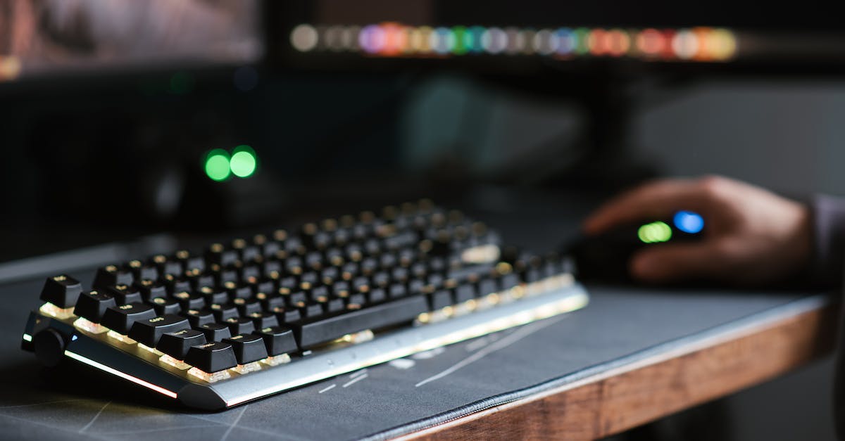 How do I play Minecraft with people online, besides using a server? [duplicate] - Crop unrecognizable person working on computer and using mouse