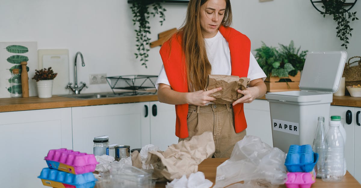 How do I preserve my save data - Young woman sorting trash for recycling