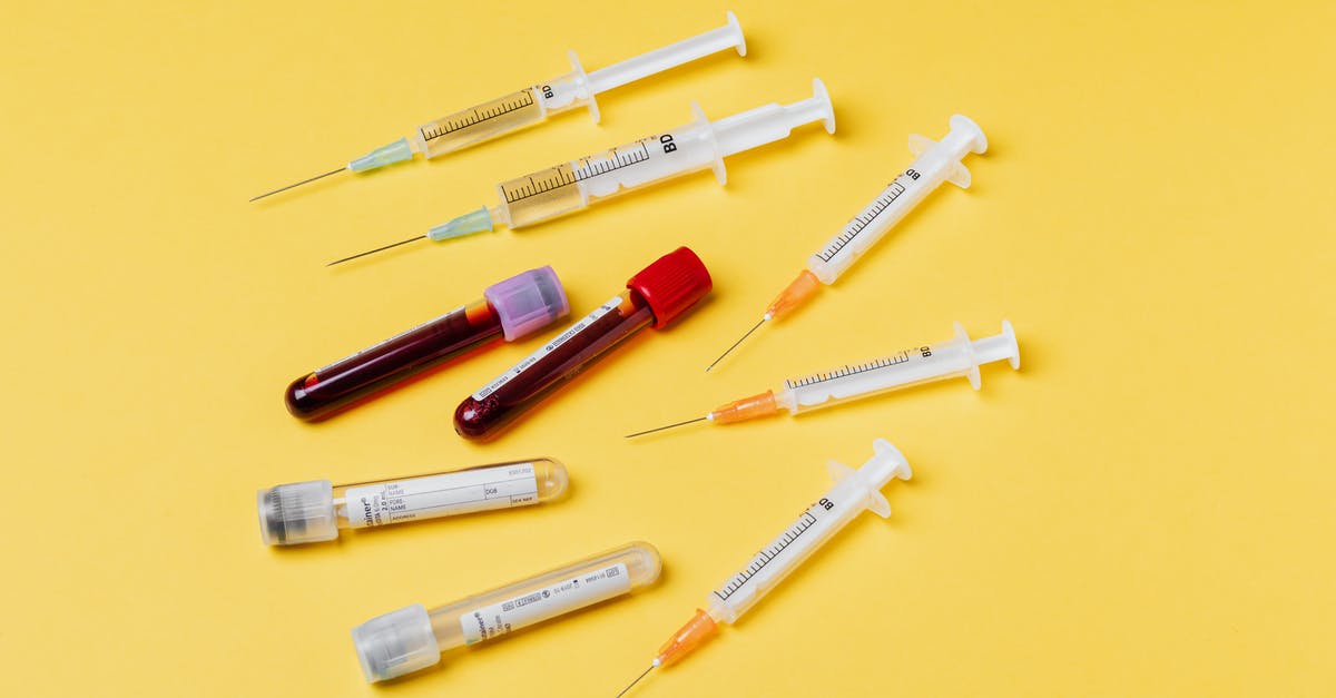 How do I prevent Death Stranding from auto-equipping blood bags? - From above composition with medical syringes of different sizes arranged with test tubes filled with blood samples placed on yellow surface How do I prevent Death Stranding from auto-equipping blood bags? - From above composition with medical syringes of different sizes arranged with test tubes filled with blood samples placed on yellow surface