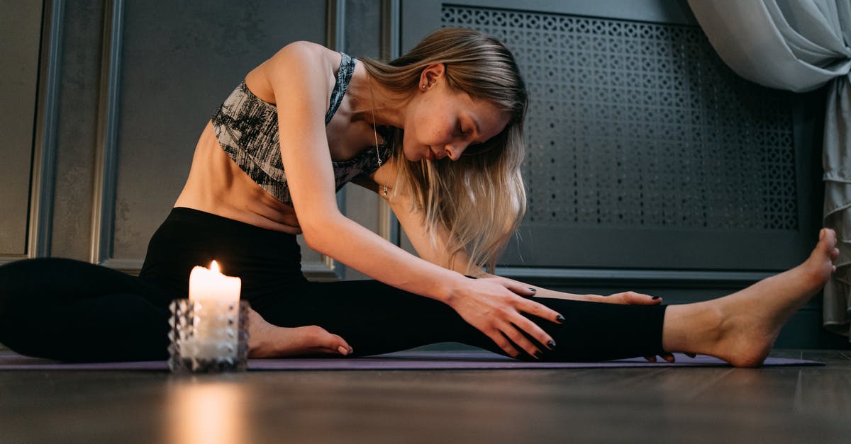 How do I put out burning teammates? - A Woman Stretching on a Yoga Mat 