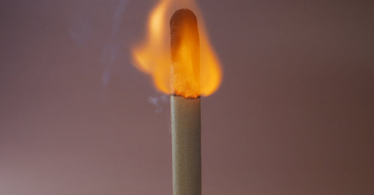 How do I put out burning teammates? - Close-Up Photo of a Burning Match Stick
