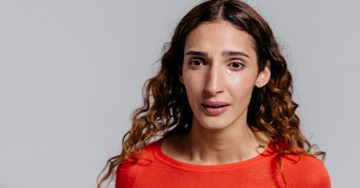 How do I question a witness with emotions instead of evidence? - Woman in Red Crew Neck Shirt