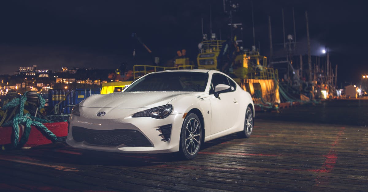 How do I reach the car park platform (Pennsylvania Plaza)? - Contemporary car parked on embankment near port at night How do I reach the car park platform (Pennsylvania Plaza)? - Contemporary car parked on embankment near port at night