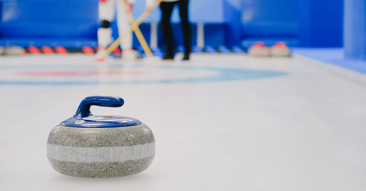 How do I regain Arcane Power effectively with my Frozen Orb Wizard? - Curling stone placed on ice against sportsmen on ice rink