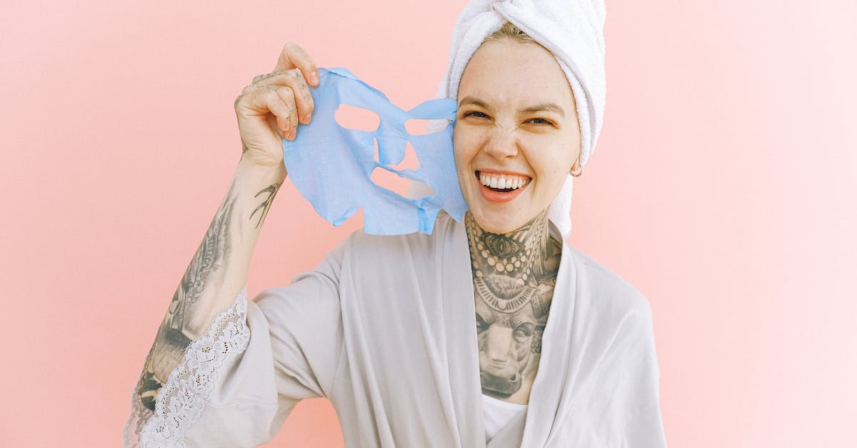 How do I remove hacked money? - Happy woman removing face mask after taking bath