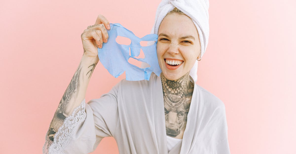how do I remove positive potion effects? - Happy woman removing face mask after taking bath how do I remove positive potion effects? - Happy woman removing face mask after taking bath