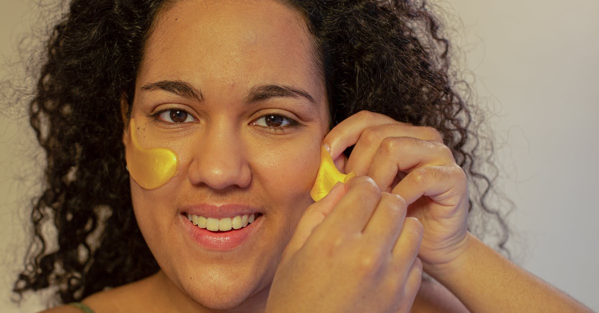 how do I remove positive potion effects? - Optimistic ethnic female doing skin care procedure with gel eye patches and looking at camera with toothy smile how do I remove positive potion effects? - Optimistic ethnic female doing skin care procedure with gel eye patches and looking at camera with toothy smile