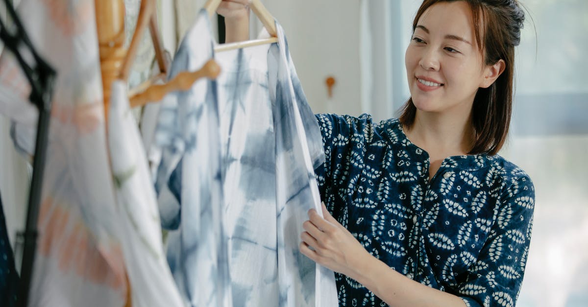 How do I report players in Halo: The Master Chief Collection on PC? - Smiling ethnic woman taking clothes on hanger from rack How do I report players in Halo: The Master Chief Collection on PC? - Smiling ethnic woman taking clothes on hanger from rack