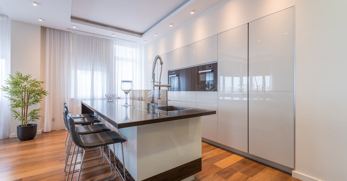 How do I restart on a new island in Battle Islands on PS4? - Modern kitchen furnished with island and built in cupboards