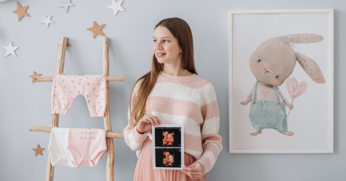 How do I scan a star? - A Pregnant Woman Holding Her Ultrasound Result