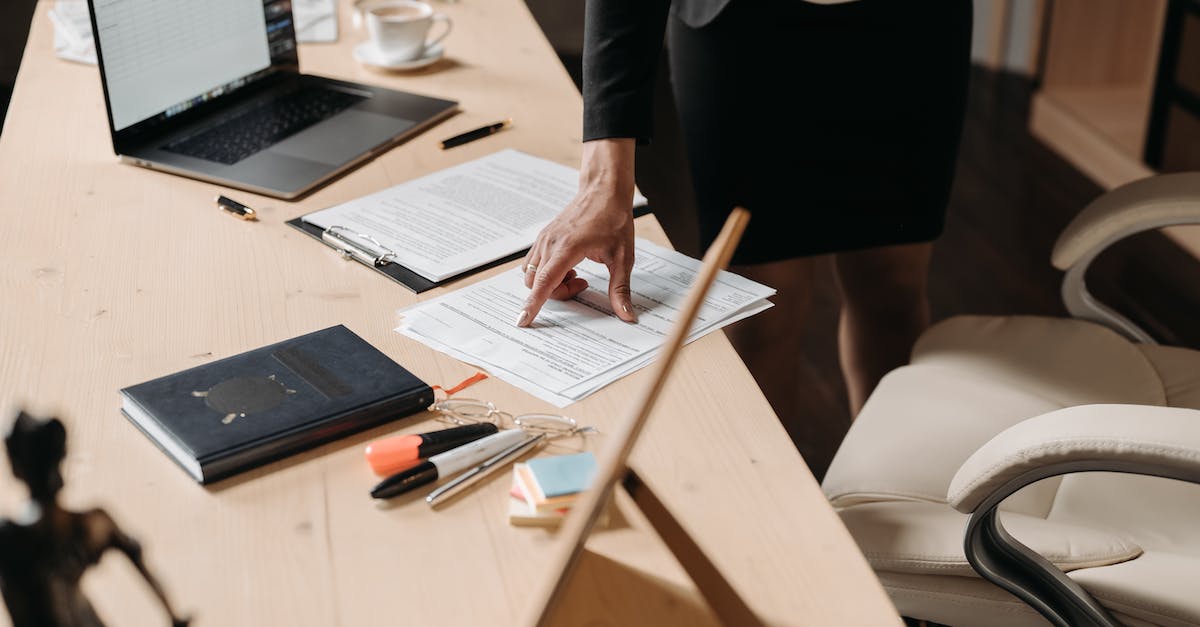 How do I score contract bonus points? - Professional Person pointing on a Contract How do I score contract bonus points? - Professional Person pointing on a Contract