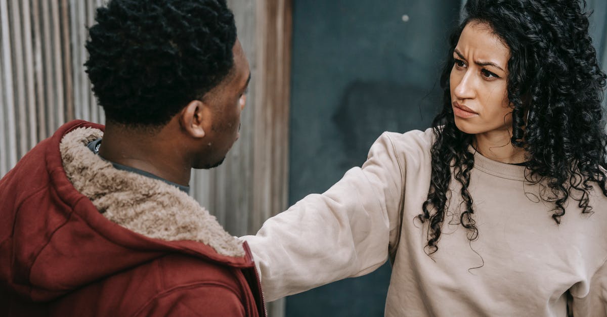 How do I separate enchants from items? - Unhappy multiethnic couple on street