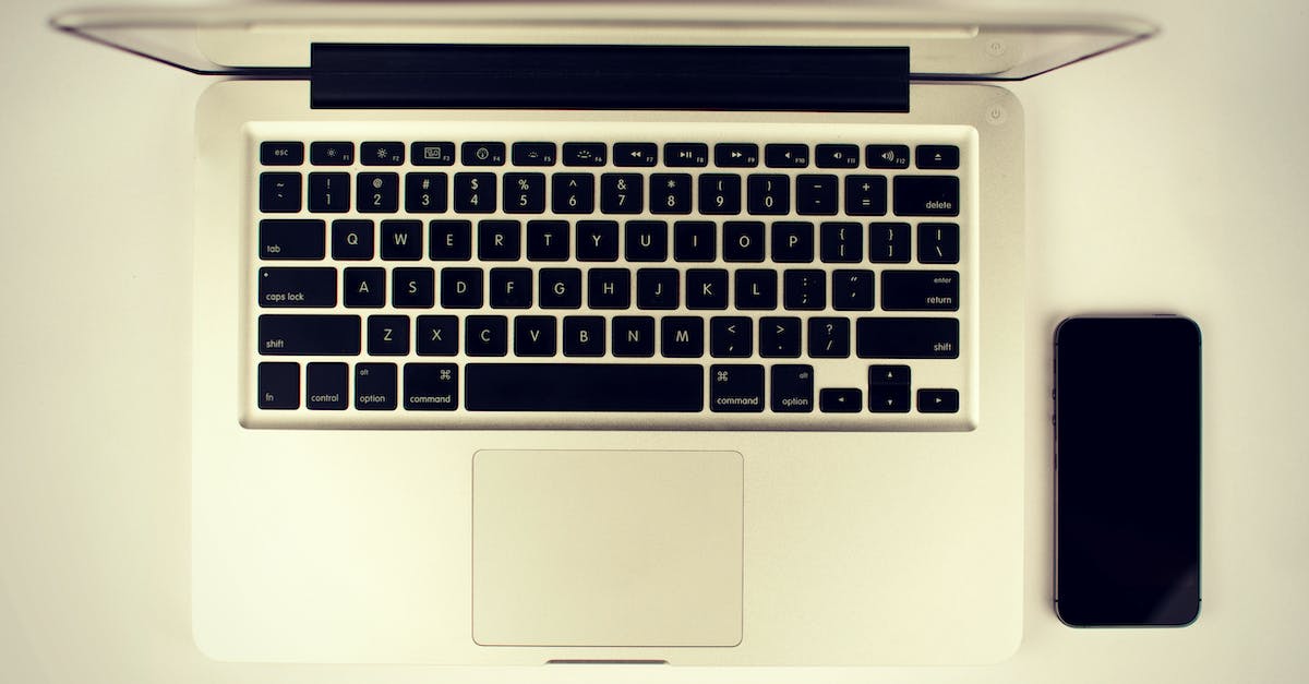 How do I set a key binding for cmd + Q on Mac OSX? - White Laptop Computer Computer Beside Black Android Smartphone How do I set a key binding for cmd + Q on Mac OSX? - White Laptop Computer Computer Beside Black Android Smartphone